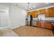 Eat-in kitchen with stainless steel appliances, and hardwood floors at 1881 S Dunkirk St # 106, Aurora, CO 80017