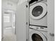 Conveniently located laundry closet with stacked washer and dryer at 1881 S Dunkirk St # 106, Aurora, CO 80017