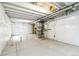 Unfinished basement featuring sealed walls, exposed ceiling, and concrete flooring, offering potential for customization at 20724 E 57Th Ave, Aurora, CO 80019