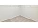 An empty walk-in closet with carpeted floors and wire shelving at 20724 E 57Th Ave, Aurora, CO 80019