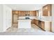 Kitchen featuring stainless appliances, white countertops, and a kitchen island at 20724 E 57Th Ave, Aurora, CO 80019