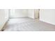 Spacious living room with modern carpeting and plenty of natural light from a bright sunny window at 20724 E 57Th Ave, Aurora, CO 80019