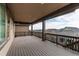 Large covered deck overlooking neighborhood; ideal for outdoor living at 8107 Arapahoe Peak St, Littleton, CO 80125
