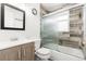 Bathroom featuring shower over tub and updated vanity at 741 Cortez St, Denver, CO 80221