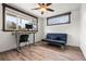 Bedroom featuring new flooring, natural light, and a versatile layout, ideal for a home office at 741 Cortez St, Denver, CO 80221