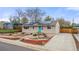 Charming home features a solar roof, a colorful front door, and low-maintenance landscaping at 741 Cortez St, Denver, CO 80221