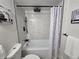 Close-up of bathroom featuring a tub with a shower and decorative curtain at 14433 E Jewell Ave # 101, Aurora, CO 80012