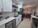 A well-appointed kitchen showcases modern appliances, granite countertops, and stylish cabinetry at 14433 E Jewell Ave # 101, Aurora, CO 80012