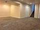 This carpeted basement offers plenty of space for storage and recreation at 3097 W 134Th Way, Broomfield, CO 80020