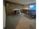 Basement space with a stone wall fireplace that provides warmth and ambience at 3097 W 134Th Way, Broomfield, CO 80020