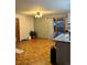 Inviting living room with wood floors, neutral paint, and sliding glass door to backyard at 3097 W 134Th Way, Broomfield, CO 80020