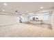 Finished basement with recreational space and bar for entertaining at 8778 S Quatar St, Aurora, CO 80016