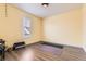 Zen room with neutral color and wood floors, perfect for yoga and meditation at 8778 S Quatar St, Aurora, CO 80016