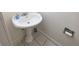 Bathroom pedestal sink and modern fixtures at 8746 Mariposa St, Thornton, CO 80260