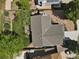 Aerial view of the property showcasing the backyard, patio, and surrounding landscape at 7466 E Long Cir, Centennial, CO 80112