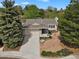 A high angle view of a charming single-Gathering home with a two-car garage and manicured landscaping at 7466 E Long Cir, Centennial, CO 80112