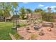 Large backyard with fire pit and wooden fence creates a cozy outdoor space at 7466 E Long Cir, Centennial, CO 80112