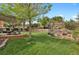 Backyard with pergola covered patio and outdoor dining at 7466 E Long Cir, Centennial, CO 80112