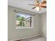 Airy bedroom with view of backyard and neutral decor at 7466 E Long Cir, Centennial, CO 80112
