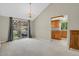 Open dining area with sliding glass doors to a backyard patio, perfect for indoor-outdoor entertaining at 7466 E Long Cir, Centennial, CO 80112