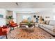 Inviting basement with stylish rug and comfortable seating arrangement at 10156 Nottingham Dr, Parker, CO 80134