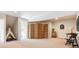 Finished basement featuring carpet floors and decorative screen at 10156 Nottingham Dr, Parker, CO 80134