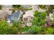 An aerial view of the home with well-manicured backyard and mature trees at 10191 Sagecrest St, Highlands Ranch, CO 80126