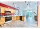 Modern kitchen with stainless steel appliances and open layout to the dining area at 10191 Sagecrest St, Highlands Ranch, CO 80126