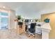Inviting home office space filled with natural light, perfect for a productive work-from-home environment at 10191 Sagecrest St, Highlands Ranch, CO 80126