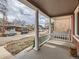 View from front porch, showcasing the neighborhood street and classic architecture at 3833 Umatilla St, Denver, CO 80211