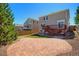 Backyard featuring a patio, deck with stairs, grass, and surrounding fence at 16893 Trail View Cir, Parker, CO 80134