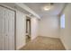Finished basement includes carpeting, closet space and a full bathroom with tiled floors at 16893 Trail View Cir, Parker, CO 80134