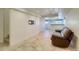Finished basement with tiled floor, recessed lighting, and wet bar area provides extra living space at 16893 Trail View Cir, Parker, CO 80134