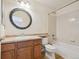Cozy bathroom featuring a vanity with drawers, decorative mirror and a tub with shower at 16893 Trail View Cir, Parker, CO 80134