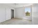Neutral bedroom with ceiling fan, closet and a window with green tree view at 16893 Trail View Cir, Parker, CO 80134