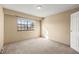 Bright bedroom with neutral walls and carpet at 8787 Yukon St, Arvada, CO 80005