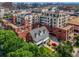 Stunning aerial view showcasing the unique architecture and inviting outdoor spaces of this desirable residence and community at 410 Acoma St # 518, Denver, CO 80204