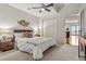 Comfortable bedroom with plush carpeting, neutral tones, ceiling fan, and a large closet, creating a relaxing retreat at 410 Acoma St # 518, Denver, CO 80204