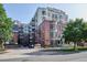 Exterior view of the building featuring a well-maintained facade and landscaping at 410 Acoma St # 518, Denver, CO 80204