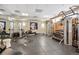 Well-equipped gym with various exercise machines, weights, and fitness equipment at 410 Acoma St # 518, Denver, CO 80204