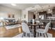 Inviting open-concept living space with hardwood floors, modern decor, and a seamless flow into the contemporary kitchen at 410 Acoma St # 518, Denver, CO 80204