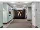 Elegant building lobby features stylish decor with the letter 