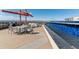 Beautiful rooftop deck featuring a unique water feature, dining and lounge spaces at 410 Acoma St # 518, Denver, CO 80204