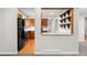 View of the kitchen with oak cabinets and a pass-through to the dining room at 15909 E Ford Pl, Aurora, CO 80017
