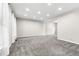 Bright living room with new gray carpet and ample natural light at 15909 E Ford Pl, Aurora, CO 80017