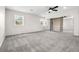 Large main bedroom features a ceiling fan, lots of windows, and mirrored closet doors at 15909 E Ford Pl, Aurora, CO 80017