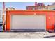 An attached two car garage, newly painted with a roll up door at 1351 N Franklin St, Denver, CO 80218