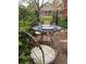 Cozy outdoor patio with a bistro table and chairs for intimate dining with an amazing view at 1351 N Franklin St, Denver, CO 80218