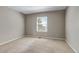 Neutral bedroom with wall-to-wall carpet and a window with blind offering bright light at 10646 Amesbury Way, Highlands Ranch, CO 80126