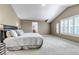 Spacious carpeted main bedroom featuring ample natural light and ensuite access at 10646 Amesbury Way, Highlands Ranch, CO 80126